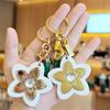 Marque de Luxe Sac Fleur Pendentif Mode Élégant Métal Cuir Créatif Exquis Polyvalent Mignon Accessoires Sac Porte-clés