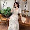 Floral dress women's summer 2026 new high-end seaside vacation first love skirt bubble sleeve medium and long dress tide
