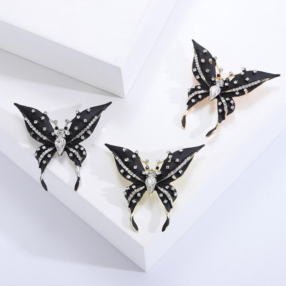 Blucome Charming Black Butterfly Brooches for Women Unisex Enamel Flying Insects Party Office Fashion Pin Gifts
