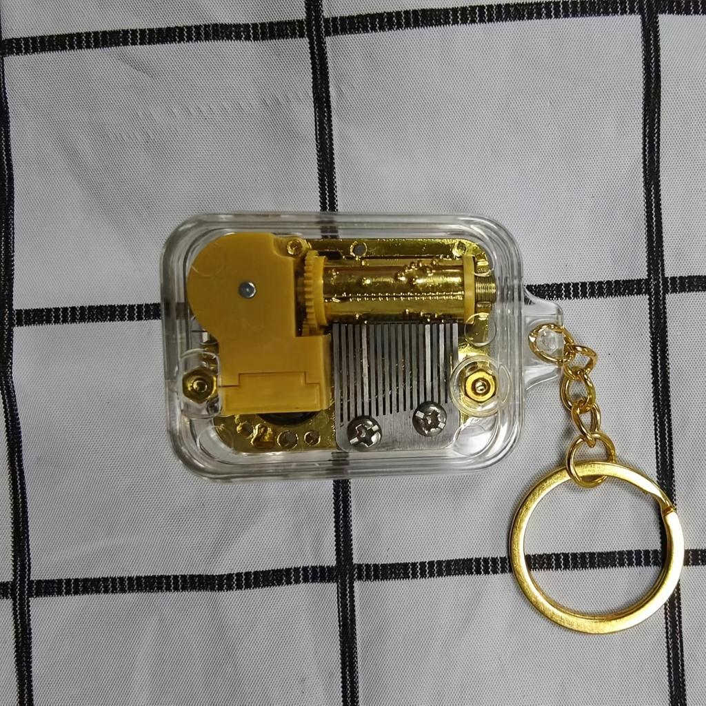 Raumdekor-Schlüsselanhänger aus Acryl mit Spieluhr, kreativer Schlüsselanhänger mit Karussellmelodie, Sky City-Design, einzigartiges Weihnachtsgeschenk und Reisesouvenir