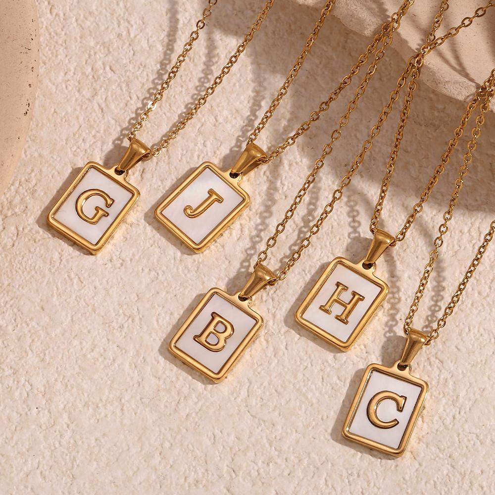 E.B.belle Minimalist Mother of Pearl Shell Stainless Steel Tarnish Free Initial Necklace Gold Plated Letter Necklace for Women