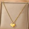 Gold Stainless Steel Cross Necklace - Light Luxury High-End Collarbone Chain with Gold Heart.