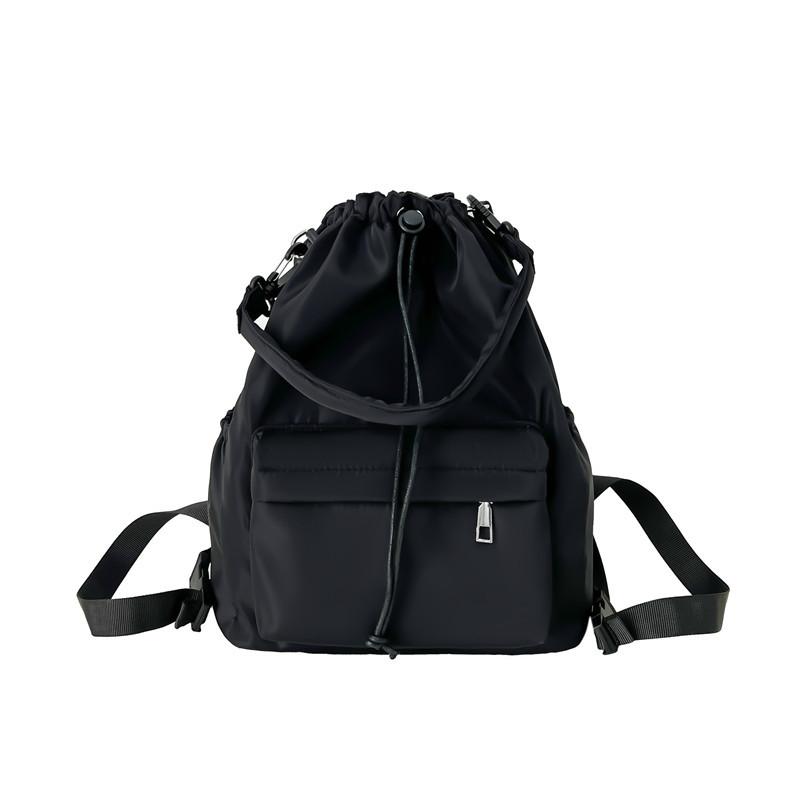 Daily versatile student schoolbag new niche design drawstring bundle shoulder bag simple commuter backpack women