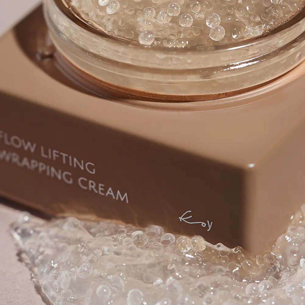 Koi Flow Lifting Straffende Creme 50ml Packung + Armband-Massagegerät + Mini-Creme 10ml 2 Stück