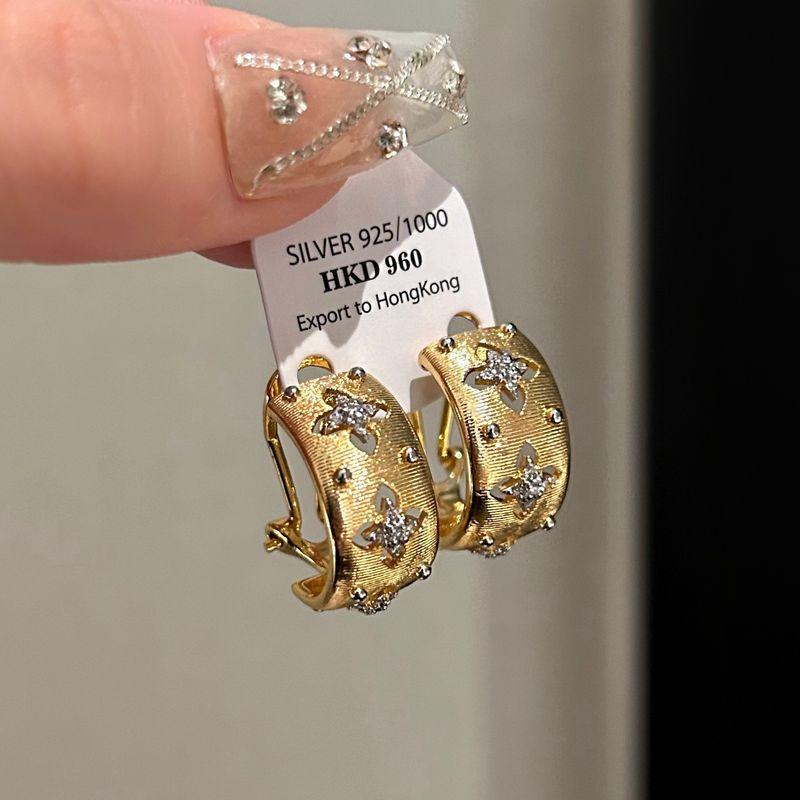 

Buchy-Style Metal Brushed Hollow Heavy-Duty Earrings with a High-End Feel, European and American Retro Four-Leaf Clover Earrings with a Niche Design Gold