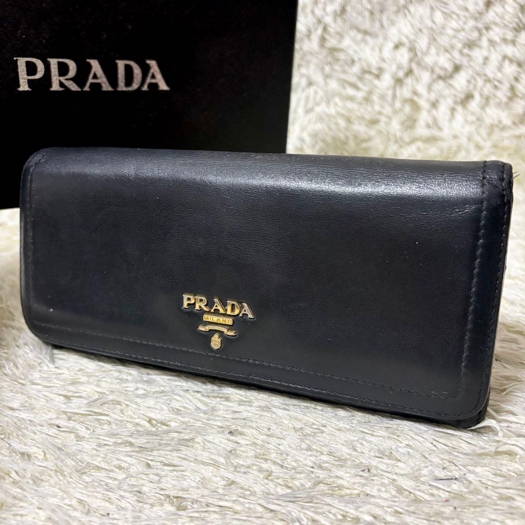 

[USED] Prada flap long wallet in two-tone black and pink with gold logo
