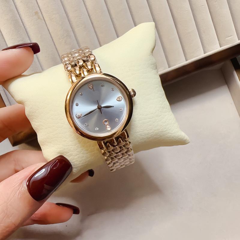 

Danielu Ladies Stainless Steel Quartz Watch with Mother-of-Pearl Dial & Rhinestone Accents