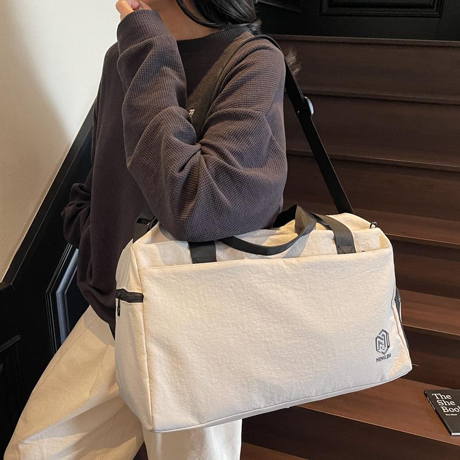 Travel bag Large capacity out portable luggage bag Women's sports handbag Dry and wet separation fitness shoulder bag