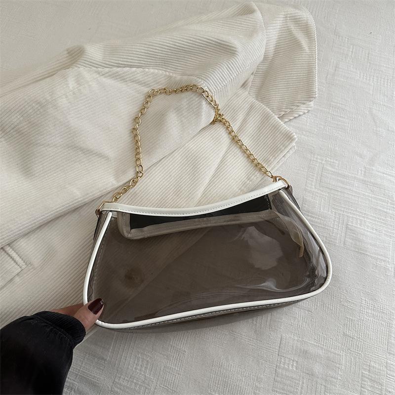 Retro design, foreign style, fashionable spring new one-shoulder messenger chain, small square bag, transparent bag, high value for women