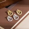 Silver Needle Elegant Chinese Style Gold Stud Earrings - High-End Luxury, Versatile Design for Women.