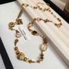 Butterfly Flower Ceramic Love Artificial Crystal Necklace High-end Autumn and Winter Sweater Chain Women's Retro Niche Jewelry