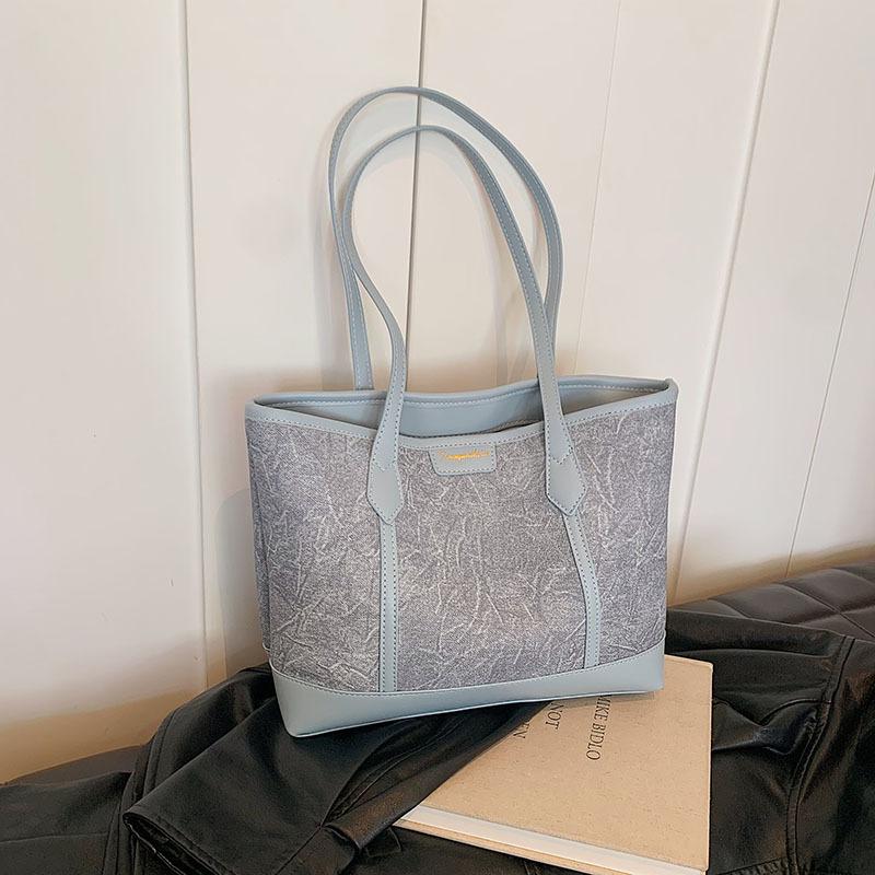 

Popular large-capacity bags women s new high-end textured shoulder bags niche fashion commuter tote bags светло-синий