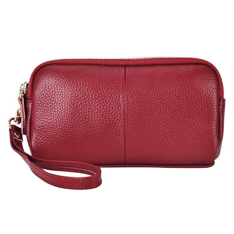One piece is sent on behalf of the first layer of cowhide clutch bag, new trendy and fashionable women's medium mother bag wallet.