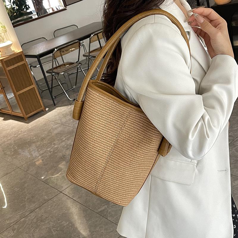 Stylish and Simple Woven Portable Bucket Bag Women's Autumn and Winter New High-end Seaside Vacation Shoulder Bag