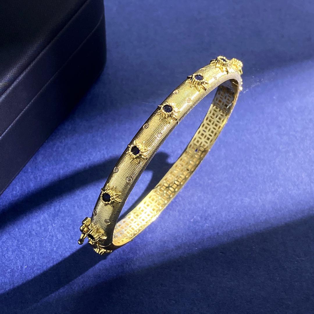 

Браслет «Подсолнух» с рубинами и бирюзой, с бриллиантовой застежкой