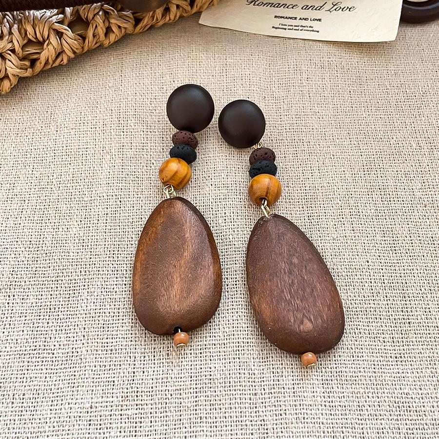 Silver Needle Wooden Raffia Oval Earrings: Ethnic Style, Retro Elegance, Unique Personality for Women.