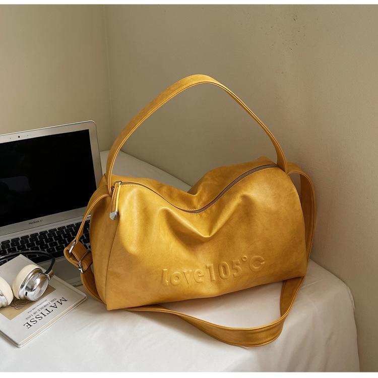 

Large capacity underarm shoulder bag 2025 new Korean version casual versatile travel bag women s fashion letter tote bag tide жёлтый