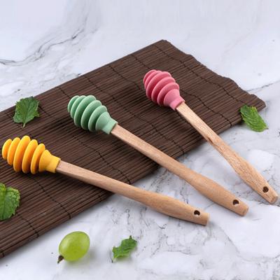 Pratico mestolo multifunzione multicolor miele con manico lungo