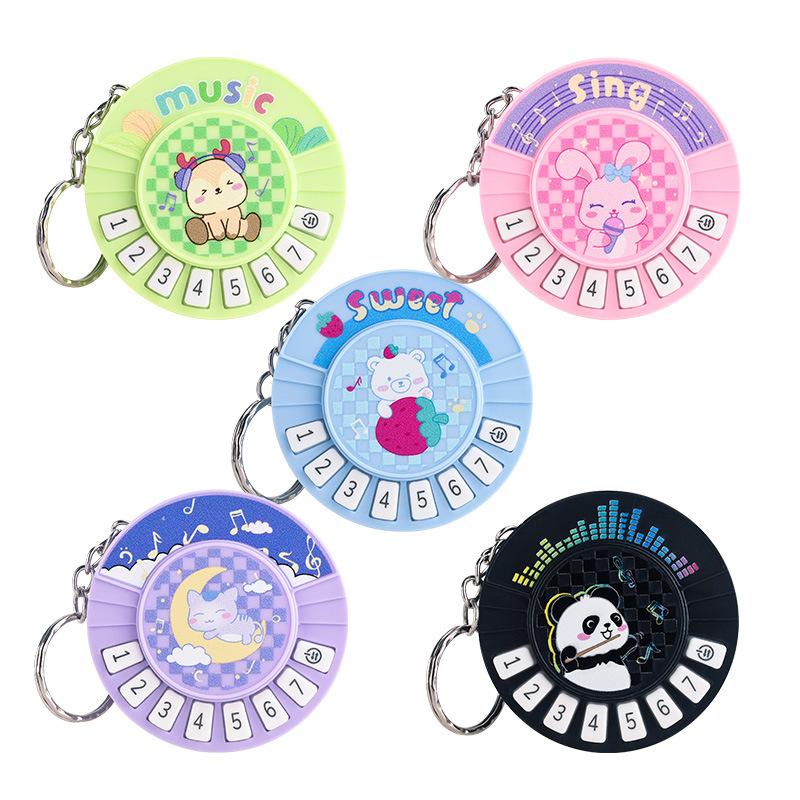 1Pc Small Piano Keychain Pendant Luminous Music Toy Playing Music Pronunciation Round Piano Xmas Holiday Present