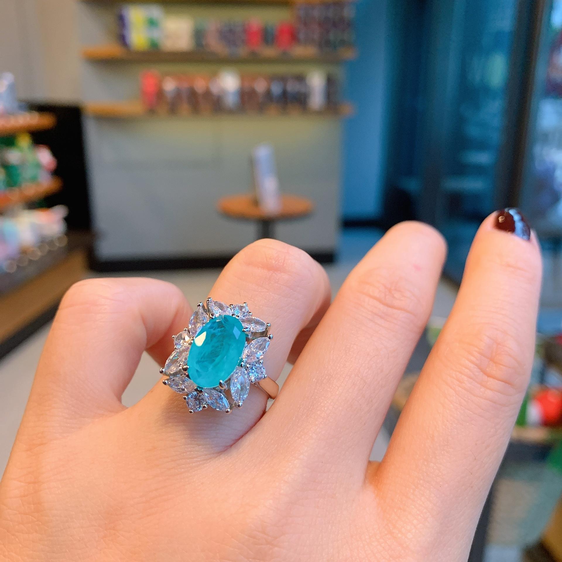 

Цветные сокровища Ювелирные изделия Имитация Параиба Серьги Подвеска Кольцо Маленький Свежий Ювелирный набор