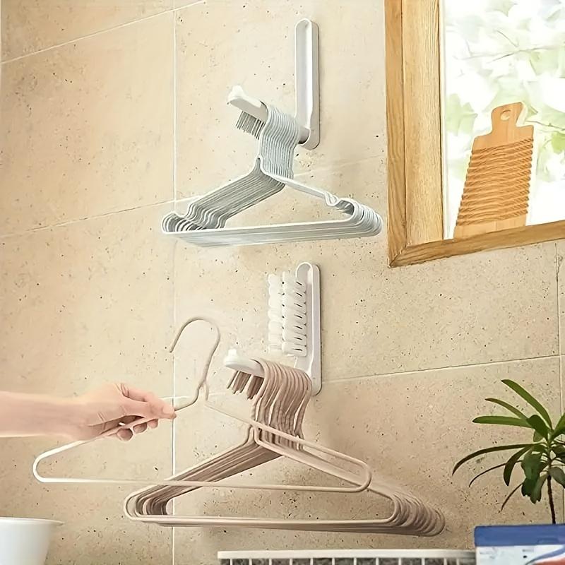 A Space-saving Clothes Hanger Device, A Foldable Hanging Storage Rack, A Hook Storage Rack And A Clothes Hanger Storage Rack