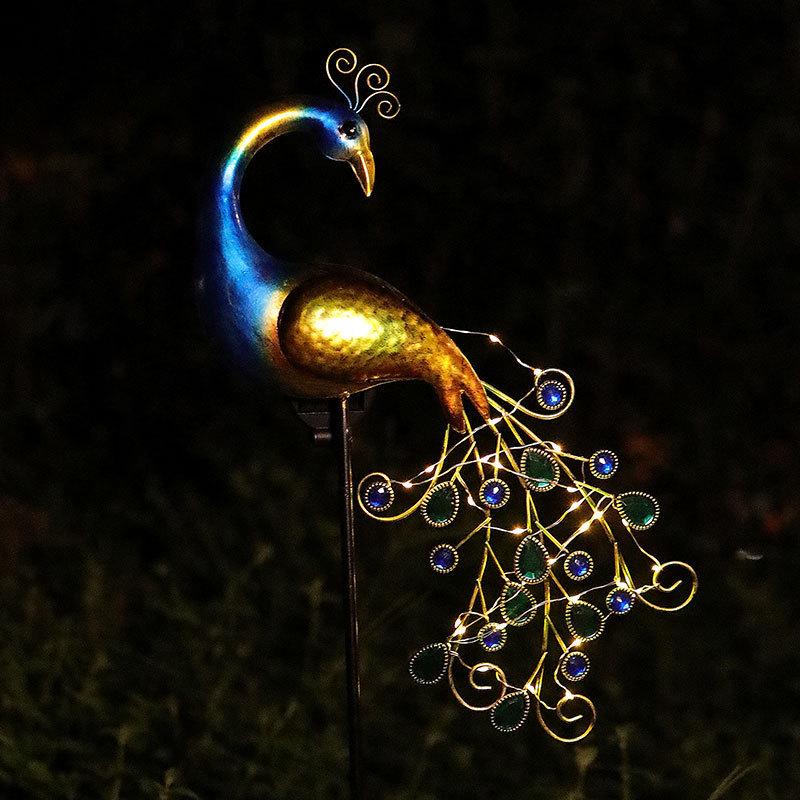 Solar Peacock Light: Waterproof Wrought Iron Garden Ornament for Lawn and Courtyard.