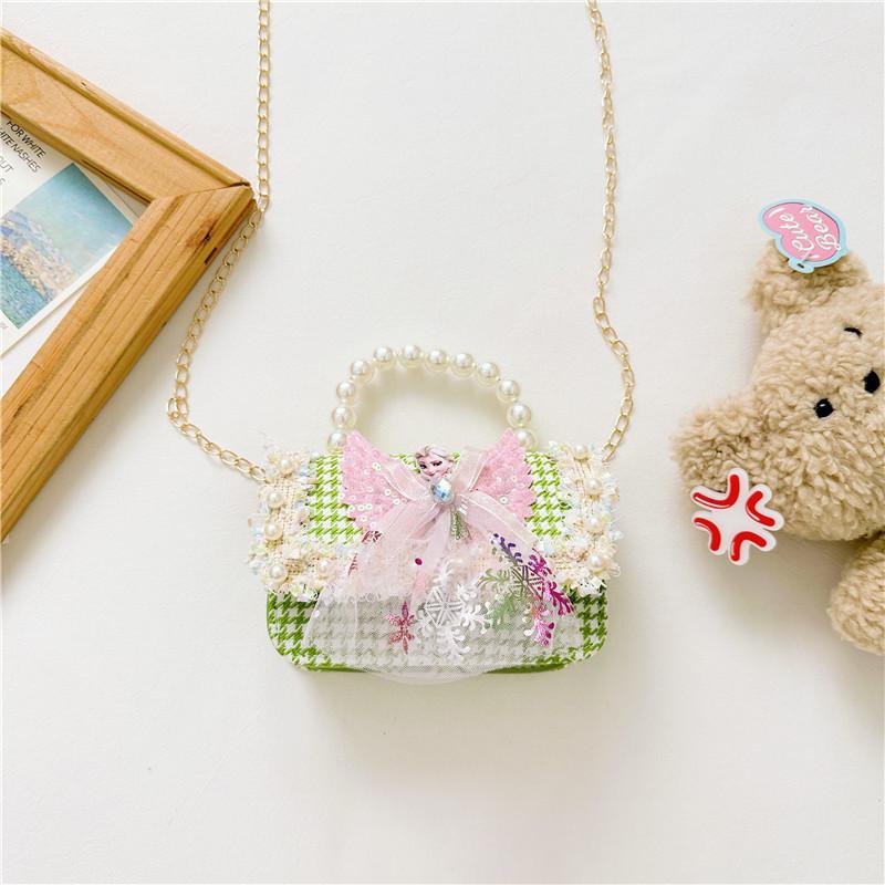 Stilvoller Prinzessinnen-Rucksack für Mädchen, verziert mit Perlen und Cartoon-Mustern in lebendigen Farben