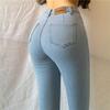 Peach Butt Slim Fit Women's Jeans - Hip Lifting, Leg Shaping, Washed Retro Pencil Pants for Spring and Autumn.