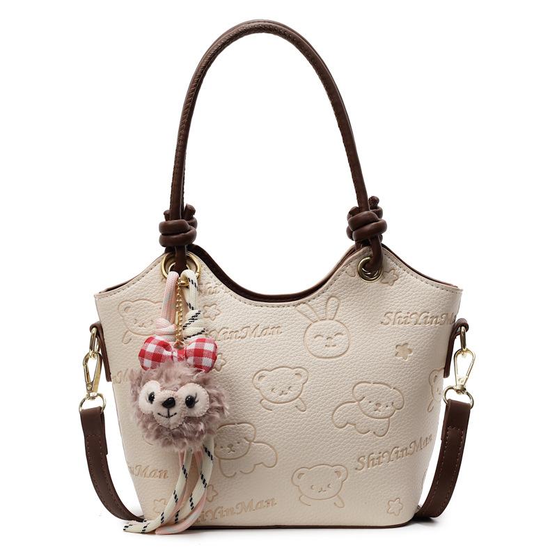 2025 new casual niche cute print high-end portable bucket bag fashionable women's commuter style messenger bag