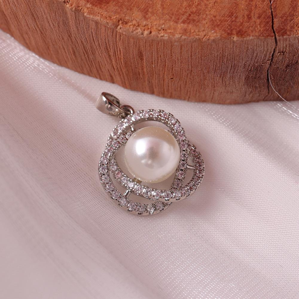 Elegant Diamond-Studded Pearl Pendant Necklace in Gold & Silver