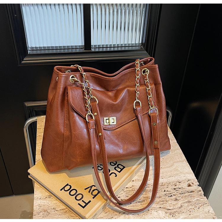 

Retro feeling large capacity design underarm tote bag women s bag new autumn and winter chain single shoulder oblique span bag коричневый