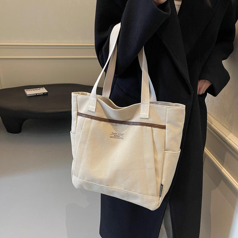 New Commuter Canvas Bag Women's Korean Ins Large-capacity Portable Tote Bag Literature and Art Student Shoulder Bag