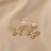 EH53-9 Hollow design butterfly earrings women's niche natural pearl stud earrings temperament versatile S925 silver needle