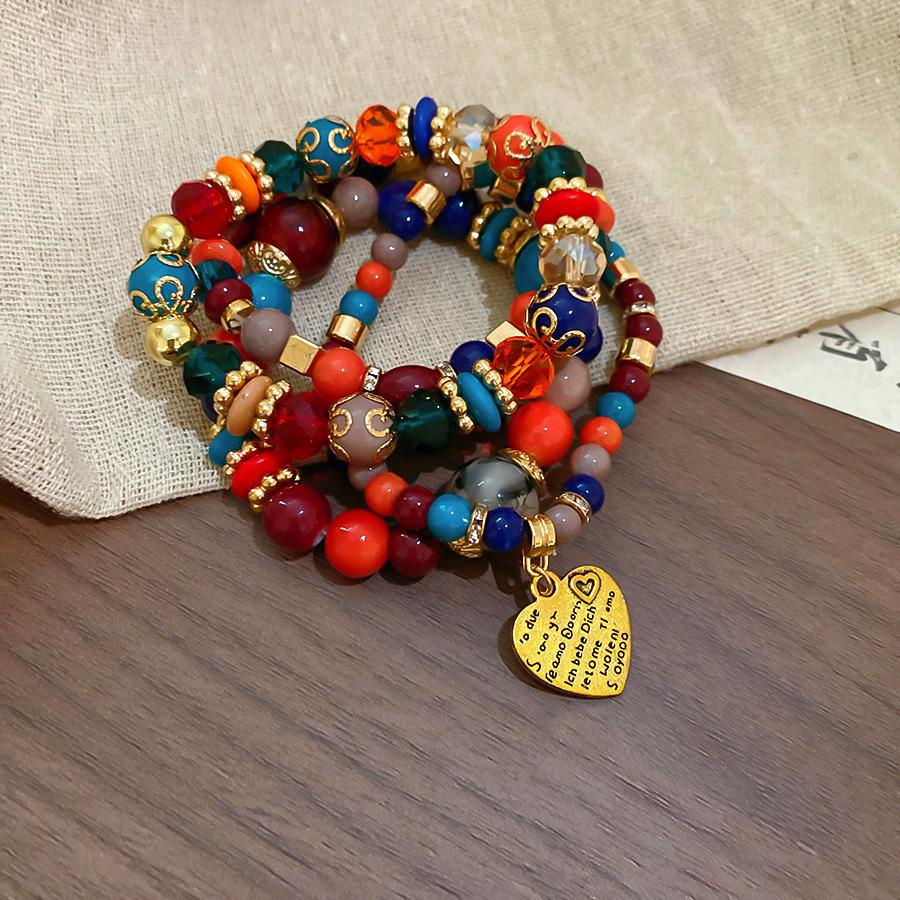 Glass Coconut Shell Beaded Wing Pendant Bracelet: Trendy, Luxurious, Versatile Jewelry for Women