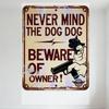 Vintage 'Never Mind The Dog, Beware Of Owner' Metal Tin Sign with Guns Illustration - Rusty Faded Aged Wall Decor for Bar Cafe M