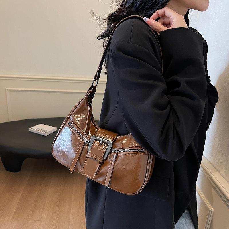 

2025 new bag niche texture baguette bag fashionable shoulder armpit bag 27*7*20 коричневый