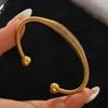 Gold Diamond Inlaid Stainless Steel Wave Pattern Bracelet - High-End Fashion Jewelry