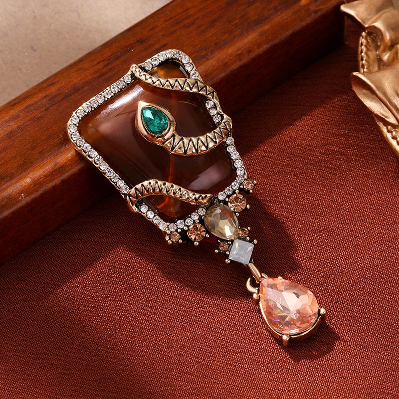 

Животное Форма Змеи Гао Цзинъань Легкая Роскошь Ретро Дворцовая Змея Украшение Брошь 3*6CM