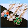 Exquisite Four Leaf Clover Metal Keychain With Vibrant Cat's Eye Stones Perfect For Special Celebrations And Events