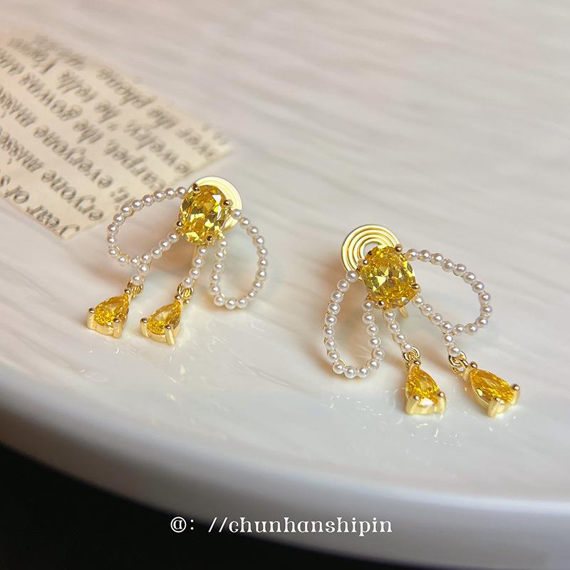 Bow pearl tassel unique pearl earrings mosquito coil disc ear clips sweet temperament stud earrings spring earrings