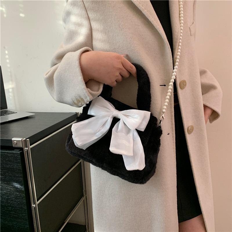 Autumn and winter new temperament fashionable plush texture simple travel small square portable bow small bag female tide