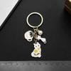 White Cat Pearl Teacup Keychain Ornament - Cartoon Drip Oil Finish