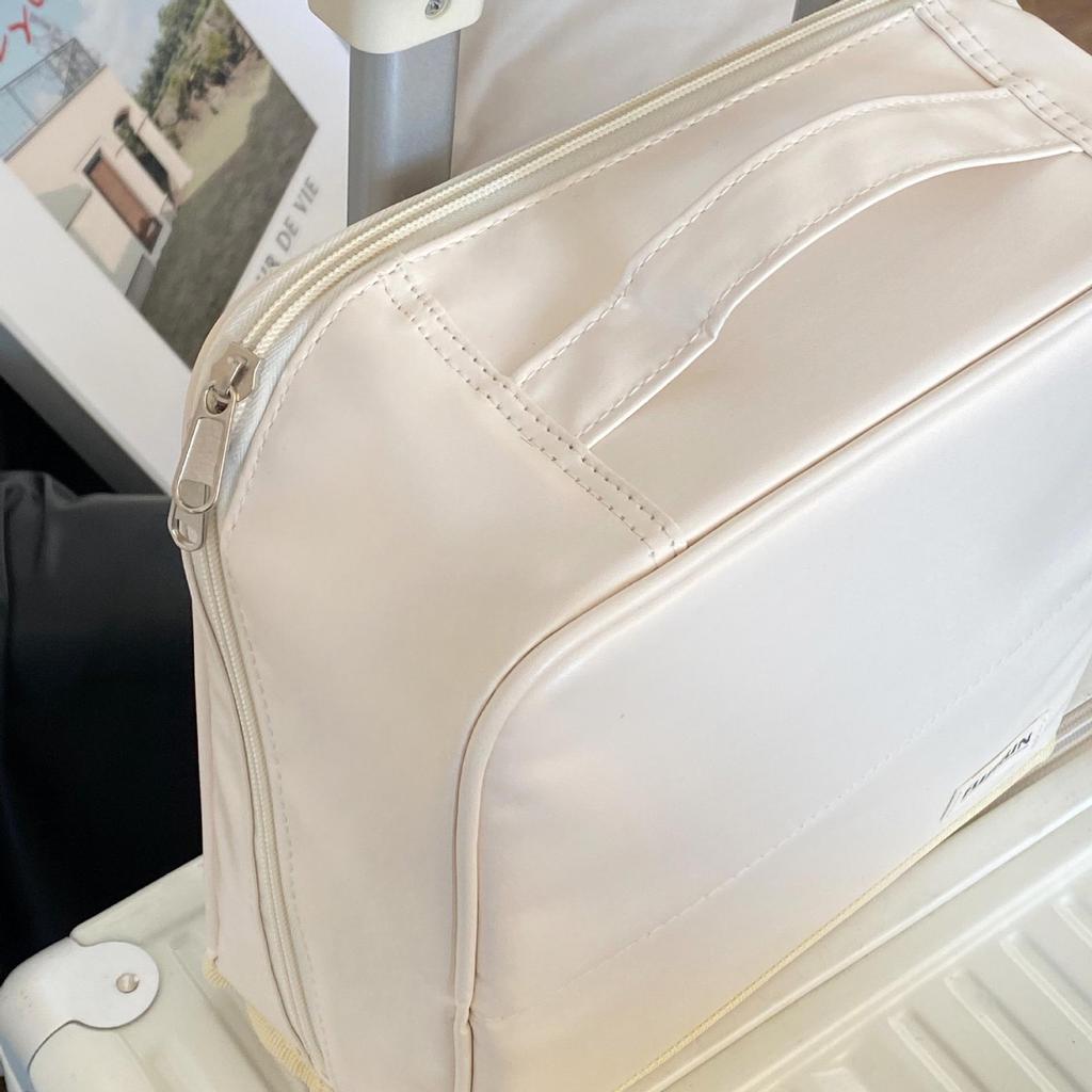 Portable Large Capacity Makeup Bag with Mirror, Hangable on Suitcase, Compartmentalized Cosmetic Storage Pouch.