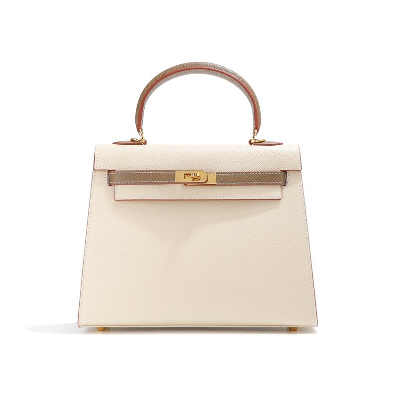 A new type of genuine leather women's handbag with a single-shoulder design, featuring a high-end hand-stitched texture and cowhide color