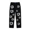 EastRogue High Street Hip Hop Streetwear Loose Fit Men's and Women's Denim Jeans with Washed Effect and Full Print of Hibiscus Flowers.