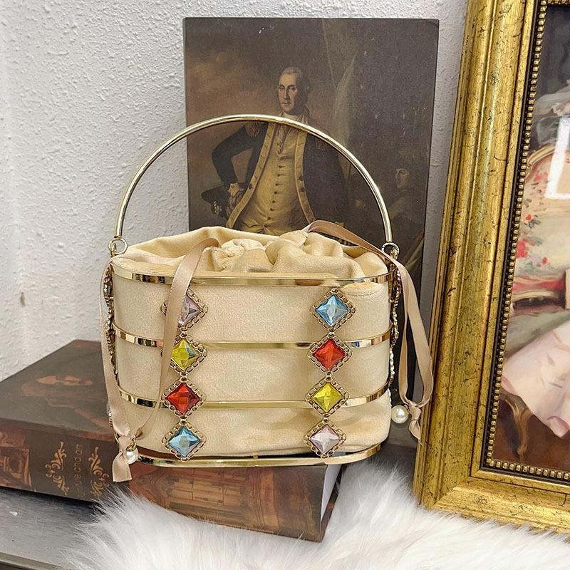 

Metal hollow diamond-encrusted colored diamond handbag hand carry evening bag light luxury bird cage bucket dinner bag