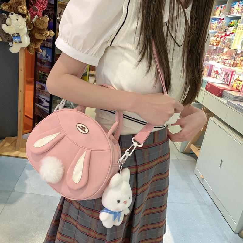 Tasche neue Umhängetasche Schultertasche koreanische Version Puppenanhänger niedliches Kaninchen Plüschtasche Canvas große Kapazität Handheld Tide