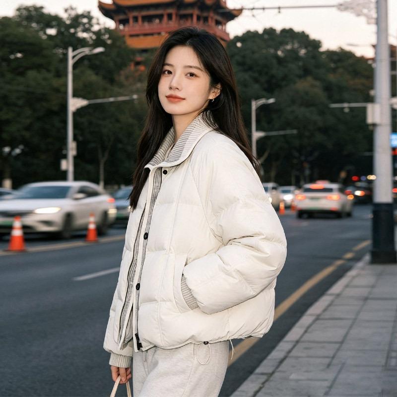 Down Jacket Women's Pinghu New Knitted Splicing Fake Two-piece Stand-up Collar Duck Down Fashion Coat