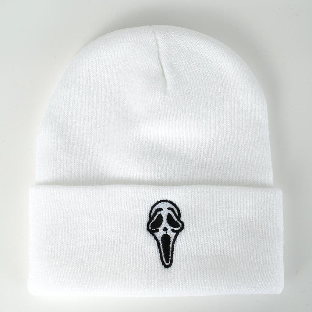 Unisex Trendy Knit Hat with Embroidered Skull Design for Street, Climbing, and Travel.
