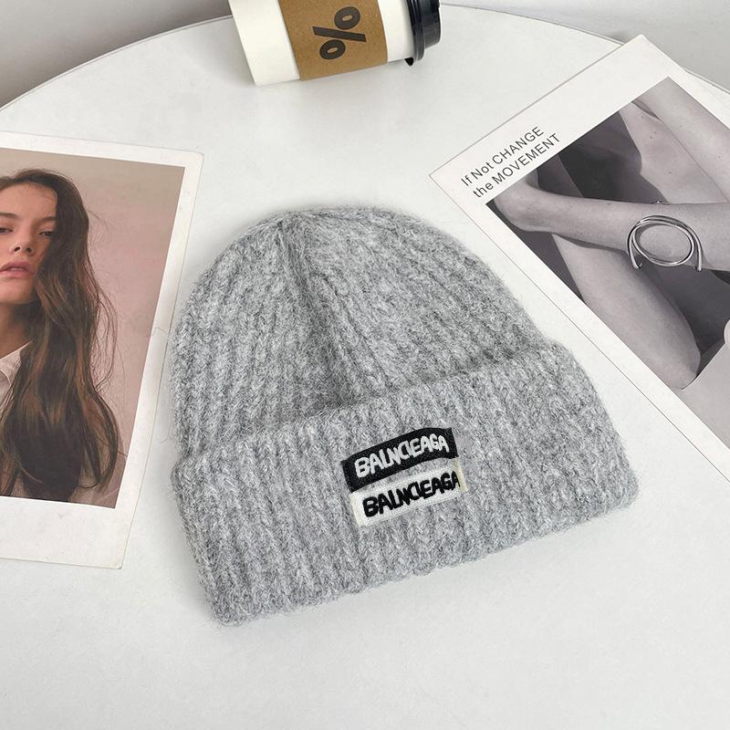 Cloth label letter knitted hat women's autumn and winter warm ear protection cycling cold hat couple versatile loose wool hat